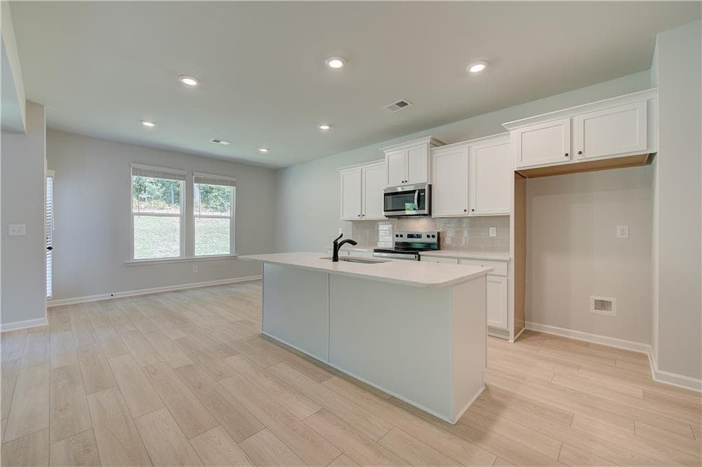 4 bedroom, 3 bathroom, 2,502 sq ft single family residence for sale at 337 Tulip Drive, Covington, GA 30016 — photo 7