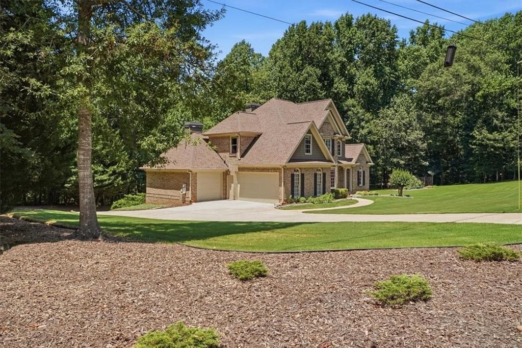 4 bedroom, 3 bathroom, 4,640 sq ft single family residence for sale at 6382 Snelling Mill Road, Flowery Branch, GA 30542 — photo 2