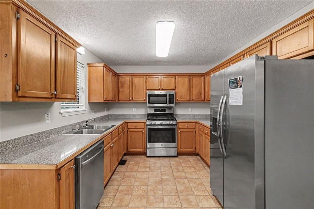 4 bedroom, 3 bathroom, 2,103 sq ft single family residence for sale at 5831 Millers Pond Lane, Powder Springs, GA 30127 — photo 3