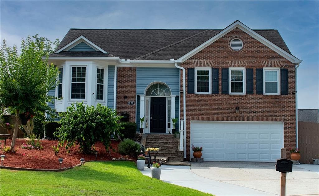 5 bedroom, 3 bathroom, 2,292 sq ft single family residence for sale at 1120 San Marcos Cove, Lawrenceville, GA 30043 — photo 2