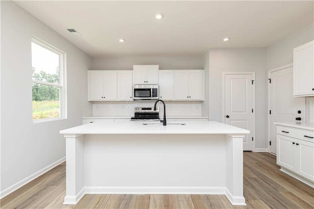 4 bedroom, 3 bathroom, 2,400 sq ft single family residence for sale at 370 Jasmine Woods Drive, Lawrenceville, GA 30046 — photo 9