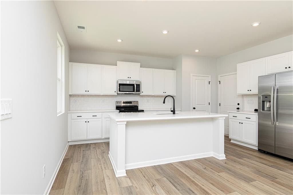 4 bedroom, 3 bathroom, 2,400 sq ft single family residence for sale at 370 Jasmine Woods Drive, Lawrenceville, GA 30046 — photo 10
