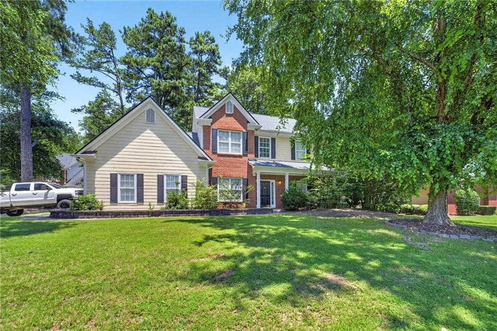 4 bedroom, 3 bathroom, 2,324 sq ft single family residence for sale at 1355 Grace Hadaway Lane, Lawrenceville, GA 30043 — photo 2