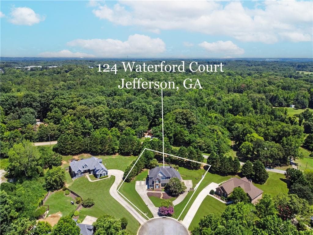 6 bedroom, 7 bathroom, 5,966 sq ft single family residence for sale at 124 Waterford Court, Jefferson, GA 30549 — photo 2