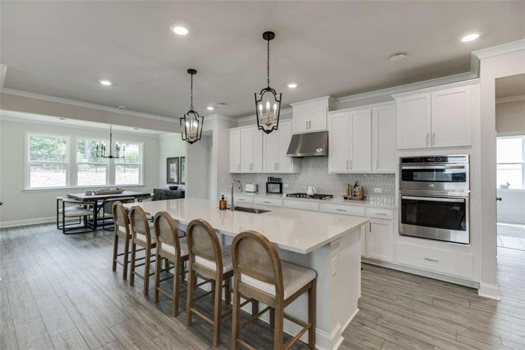 5 bedroom, 4 bathroom, 3,420 sq ft single family residence for sale at 5960 Misty Hill Lane, Buford, GA 30518 — photo 2