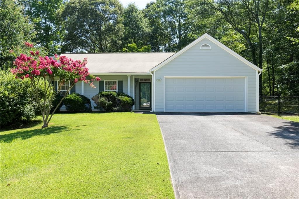 3 bedroom, 2 bathroom, 1,400 sq ft single family residence for sale at 5021 River Rock Way, Woodstock, GA 30188 — photo 2