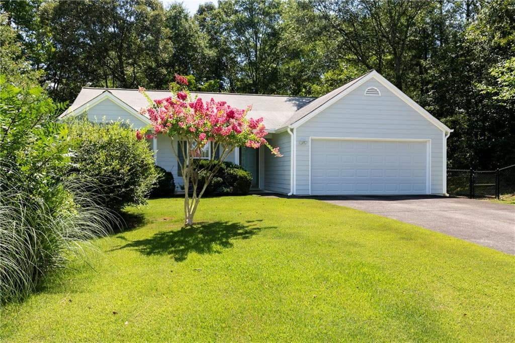 3 bedroom, 2 bathroom, 1,400 sq ft single family residence for sale at 5021 River Rock Way, Woodstock, GA 30188 — photo 3