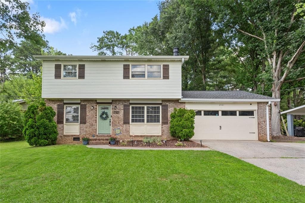 4 bedroom, 3 bathroom, 2,363 sq ft single family residence sold at 2161 Powers Ferry Drive, Marietta, GA 30067