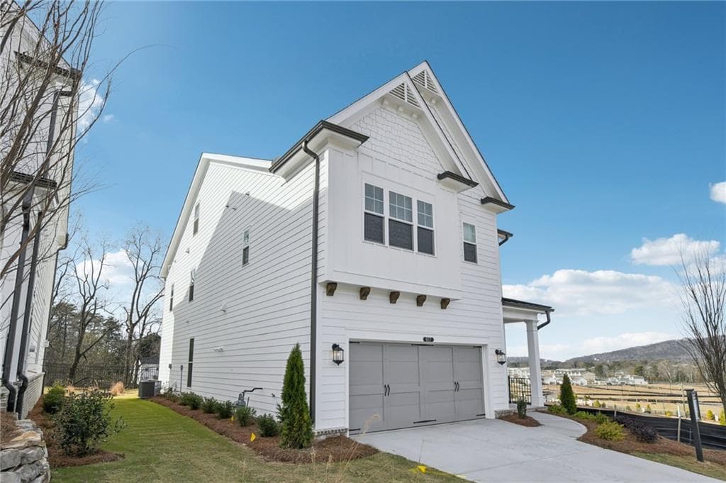 4 bedroom, 3 bathroom, 2,453 sq ft single family residence for sale at 620 Silva Street, Cumming, GA 30040 — photo 4