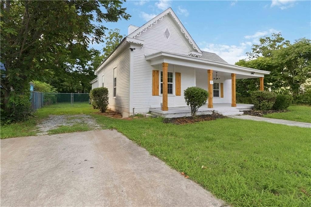 3 bedroom, 2 bathroom, 1,862 sq ft single family residence for sale at 6860 Main Street, Lithonia, GA 30058 — photo 2