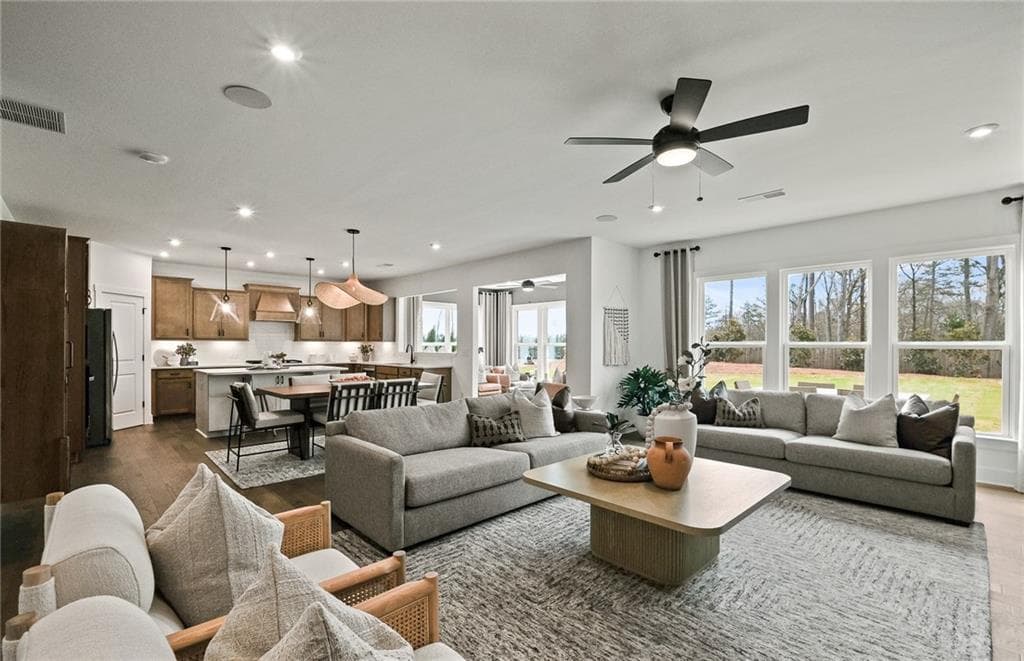 5 bedroom, 4 bathroom, 3,554 sq ft single family residence for sale at 7266 Thistle Down Way, Flowery Branch, GA 30542 — photo 6