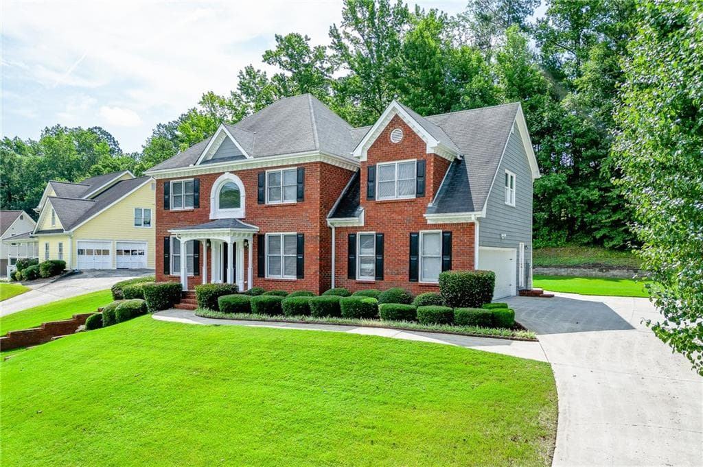 4 bedroom, 3 bathroom, 2,748 sq ft single family residence for sale at 4102 Trotters Way Drive, Snellville, GA 30039 — photo 2