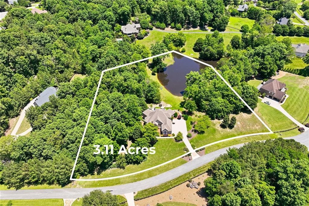 6 bedroom, 5 bathroom, 7,206 sq ft single family residence for sale at 8235 Hurakan Creek Crossing, Cumming, GA 30028 — photo 2