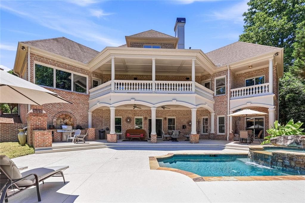 6 bedroom, 5 bathroom, 7,206 sq ft single family residence for sale at 8235 Hurakan Creek Crossing, Cumming, GA 30028 — photo 4