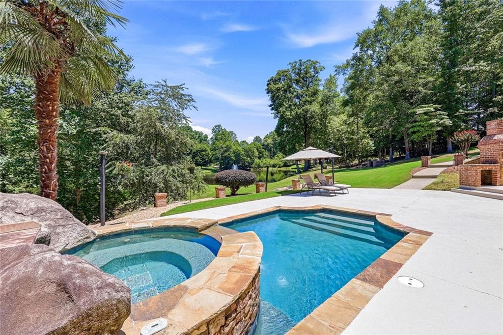 6 bedroom, 5 bathroom, 7,206 sq ft single family residence for sale at 8235 Hurakan Creek Crossing, Cumming, GA 30028 — photo 5