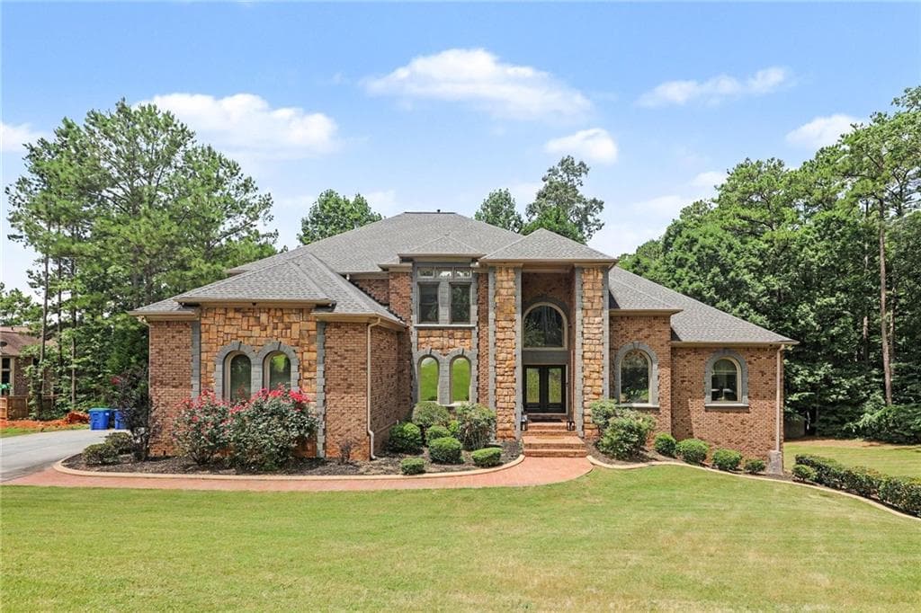 6 bedroom, 7 bathroom, 6,450 sq ft single family residence for sale at 327 Amy Way, Atlanta, GA 30349 — photo 1 of 53