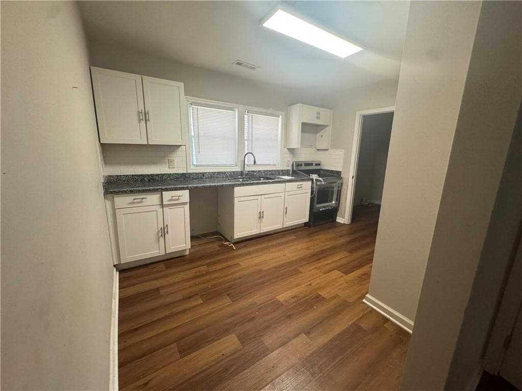 5 bedroom, 2 bathroom, 1,488 sq ft single family residence under contract at 1030 Westmoor Drive, Atlanta, GA 30314 — photo 6