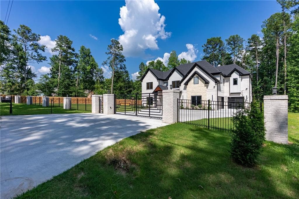5 bedroom, 6 bathroom, 6,400 sq ft single family residence under contract at 1613 Azalea Drive, Lawrenceville, GA 30043