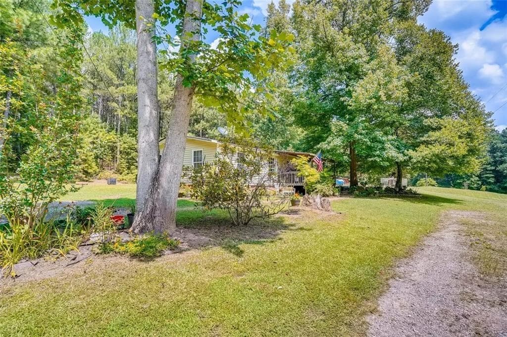 3 bedroom, 2 bathroom, 1,056 sq ft single family residence for sale at 3397 Knox Bridge Highway, Canton, GA 30114 — photo 4
