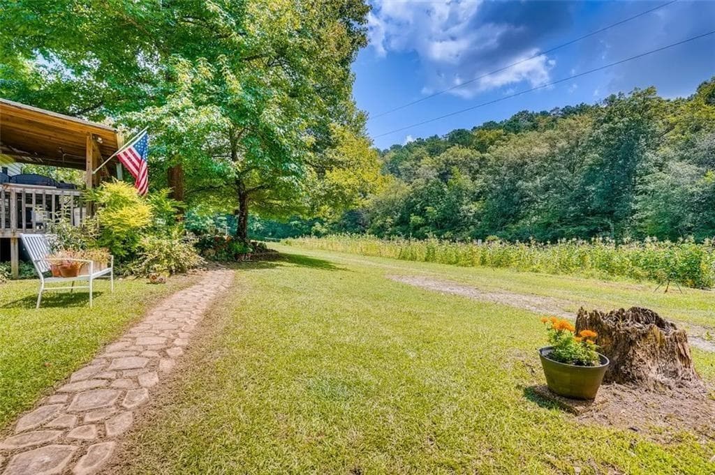 3 bedroom, 2 bathroom, 1,056 sq ft single family residence for sale at 3397 Knox Bridge Highway, Canton, GA 30114 — photo 5