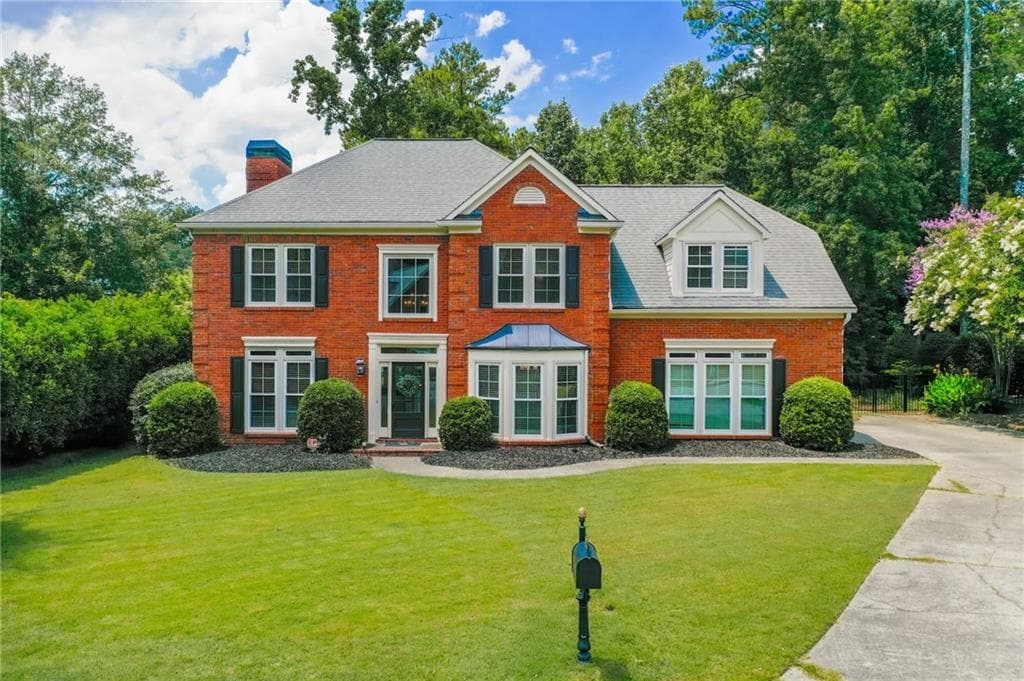 4 bedroom, 3 bathroom, 2,628 sq ft single family residence sold at 6214 Poplar Bluff Circle, Peachtree Corners, GA 30092