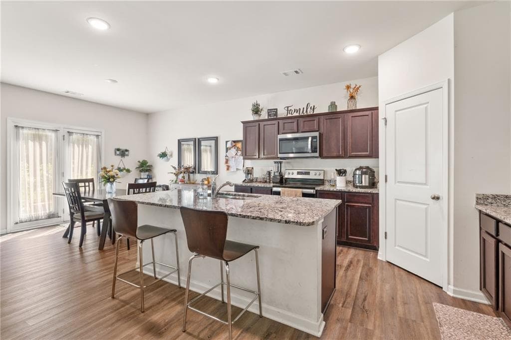 4 bedroom, 3 bathroom, 2,479 sq ft single family residence for sale at 155 Cherohala Court, Covington, GA 30016 — photo 6