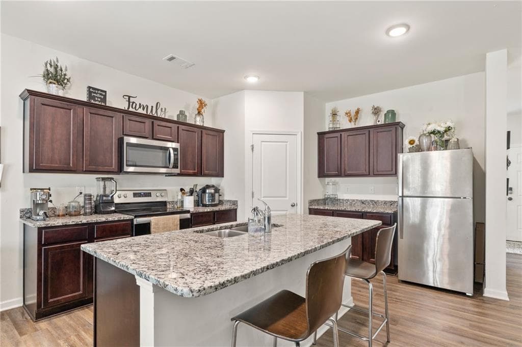 4 bedroom, 3 bathroom, 2,479 sq ft single family residence for sale at 155 Cherohala Court, Covington, GA 30016 — photo 7