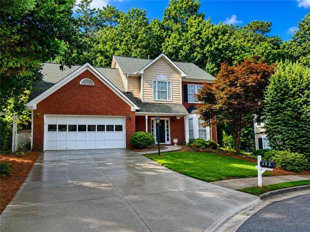 4 bedroom, 3 bathroom, 2,266 sq ft single family residence sold at 395 Manor Glen Drive, Suwanee, GA 30024
