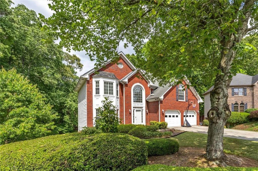 6 bedroom, 4 bathroom, 4,043 sq ft single family residence for sale at 1918 De Winton Place, Lawrenceville, GA 30043 — photo 4
