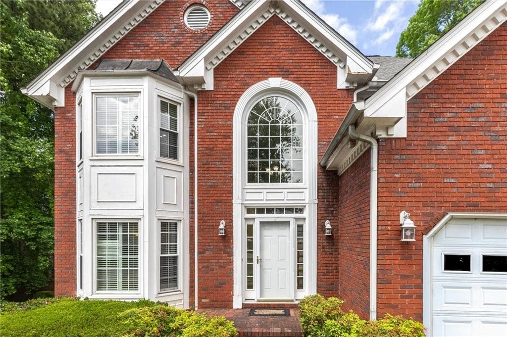 6 bedroom, 4 bathroom, 4,043 sq ft single family residence for sale at 1918 De Winton Place, Lawrenceville, GA 30043 — photo 5