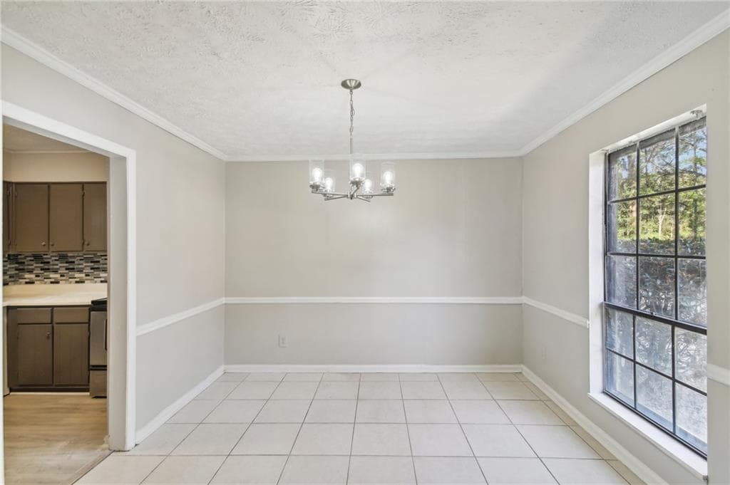 3 bedroom, 2 bathroom, 1,302 sq ft townhouse for sale at 6429 Woodstone Way, Morrow, GA 30260 — photo 5