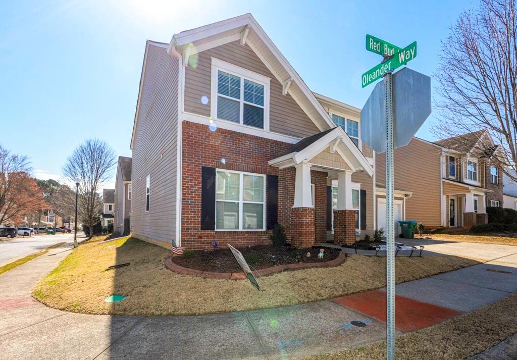 4 bedroom, 3 bathroom, 2,010 sq ft single family residence for sale at 1201 RED BUD Lane, Canton, GA 30114 — photo 2