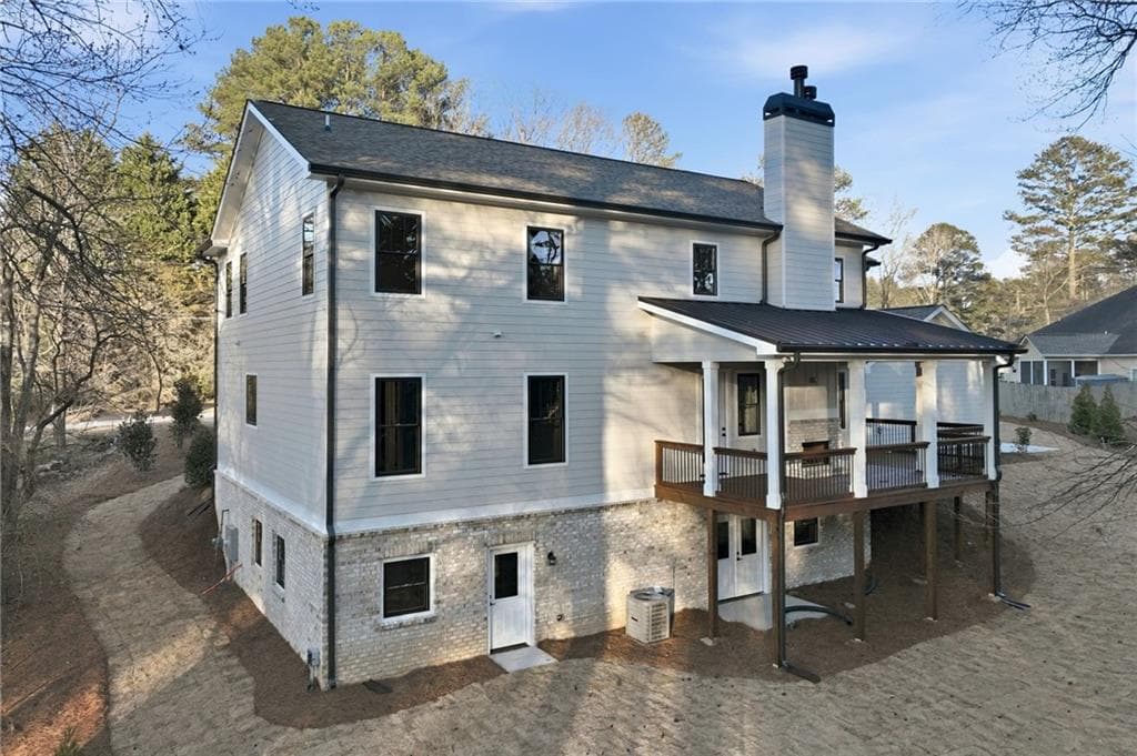 5 bedroom, 4 bathroom, 5,526 sq ft single family residence for sale at 6054 Stewart Road, Buford, GA 30518 — photo 6