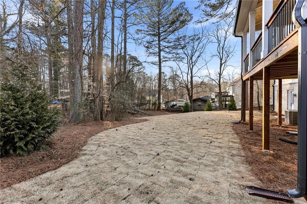 5 bedroom, 4 bathroom, 5,526 sq ft single family residence for sale at 6054 Stewart Road, Buford, GA 30518 — photo 8