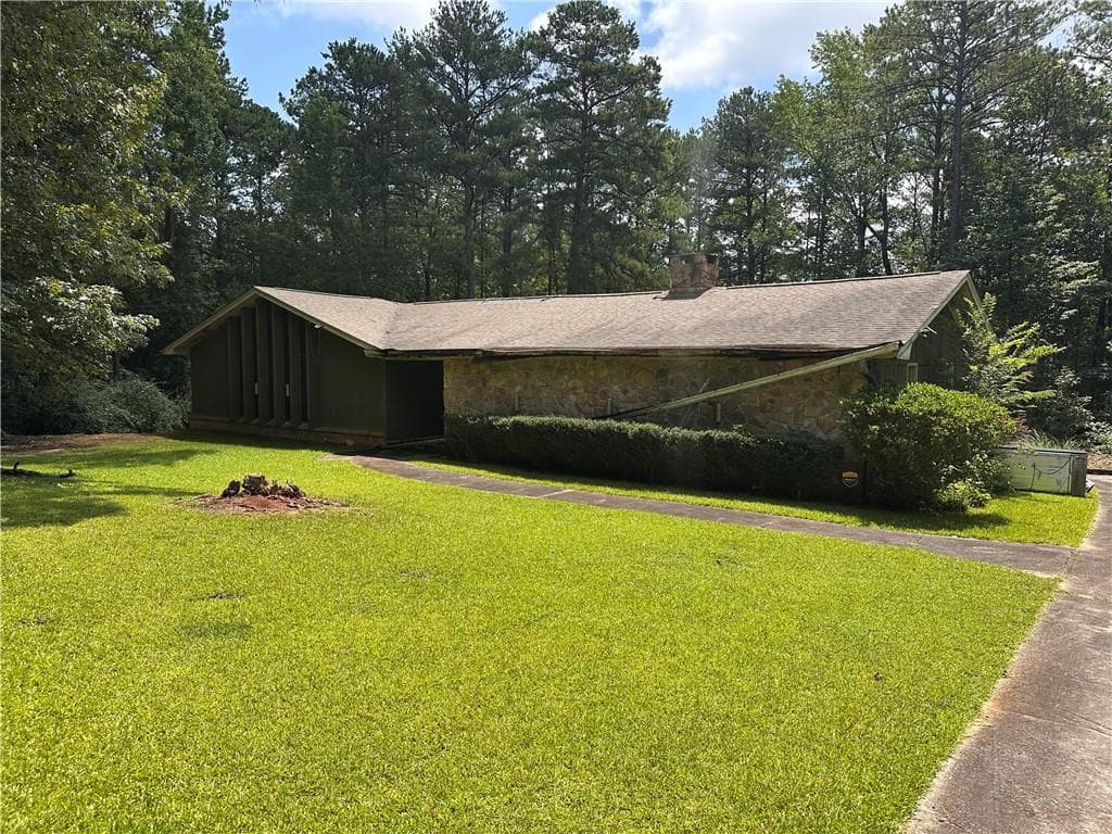 3 bedroom, 2 bathroom, 2,200 sq ft single family residence for sale at 4520 Thompson Road, Atlanta, GA 30349