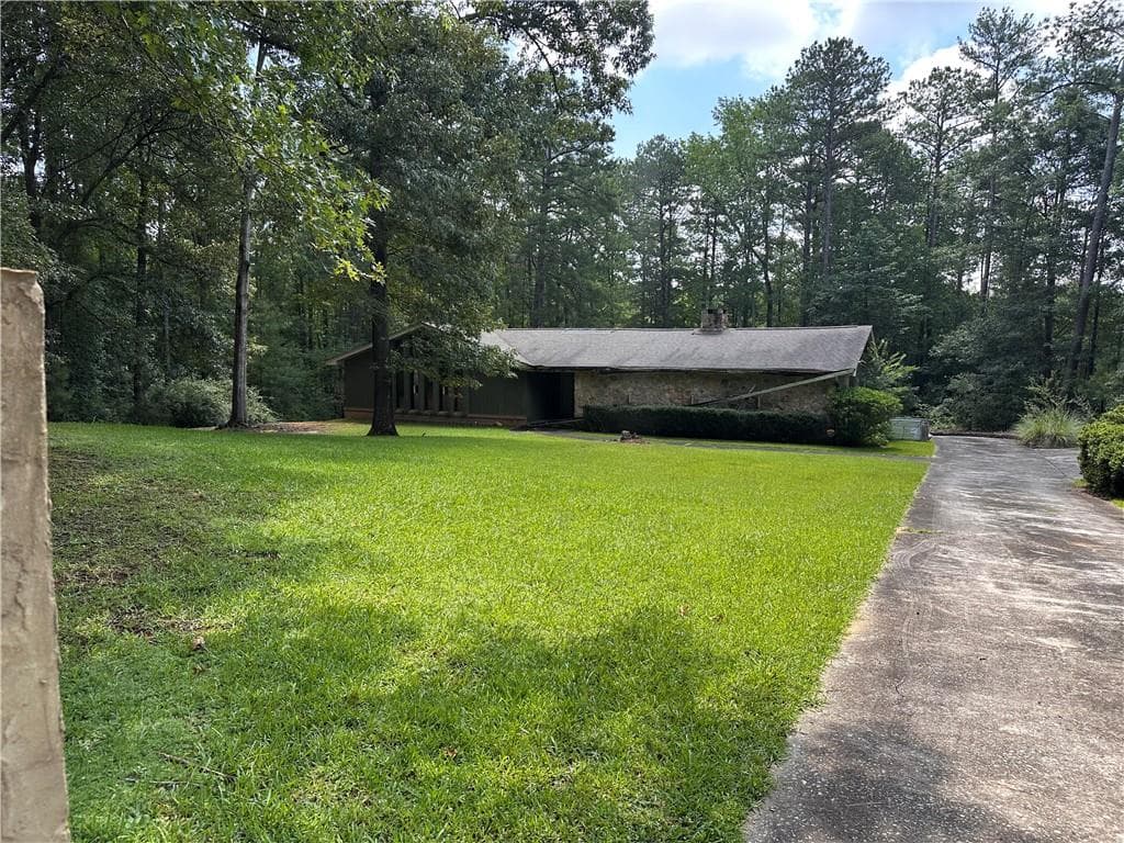 3 bedroom, 2 bathroom, 2,200 sq ft single family residence for sale at 4520 Thompson Road, Atlanta, GA 30349 — photo 2