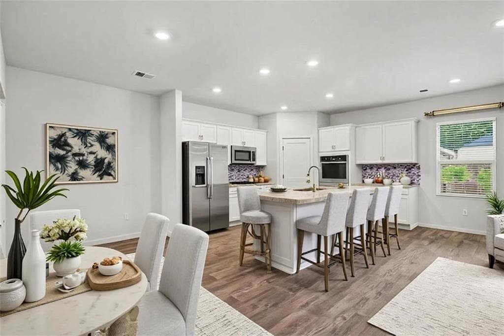 4 bedroom, 3 bathroom, 2,724 sq ft single family residence for sale at 1217 Hibiscus Way, Mcdonough, GA 30253 — photo 4