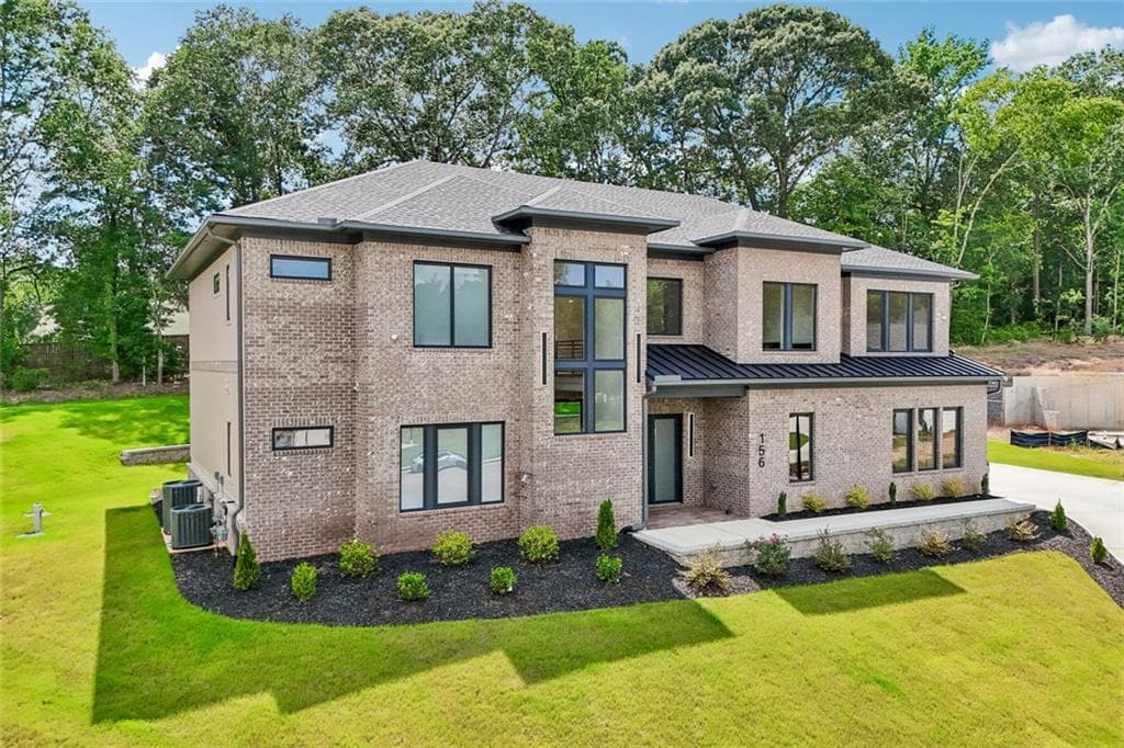 4 bedroom, 5 bathroom, 4,600 sq ft single family residence for sale at 156 Rocky Ridge Way, Auburn, GA 30011 — photo 2