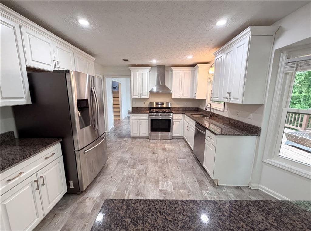 4 bedroom, 3 bathroom, 2,122 sq ft single family residence for sale at 4378 Shady Drive, Lilburn, GA 30047 — photo 2