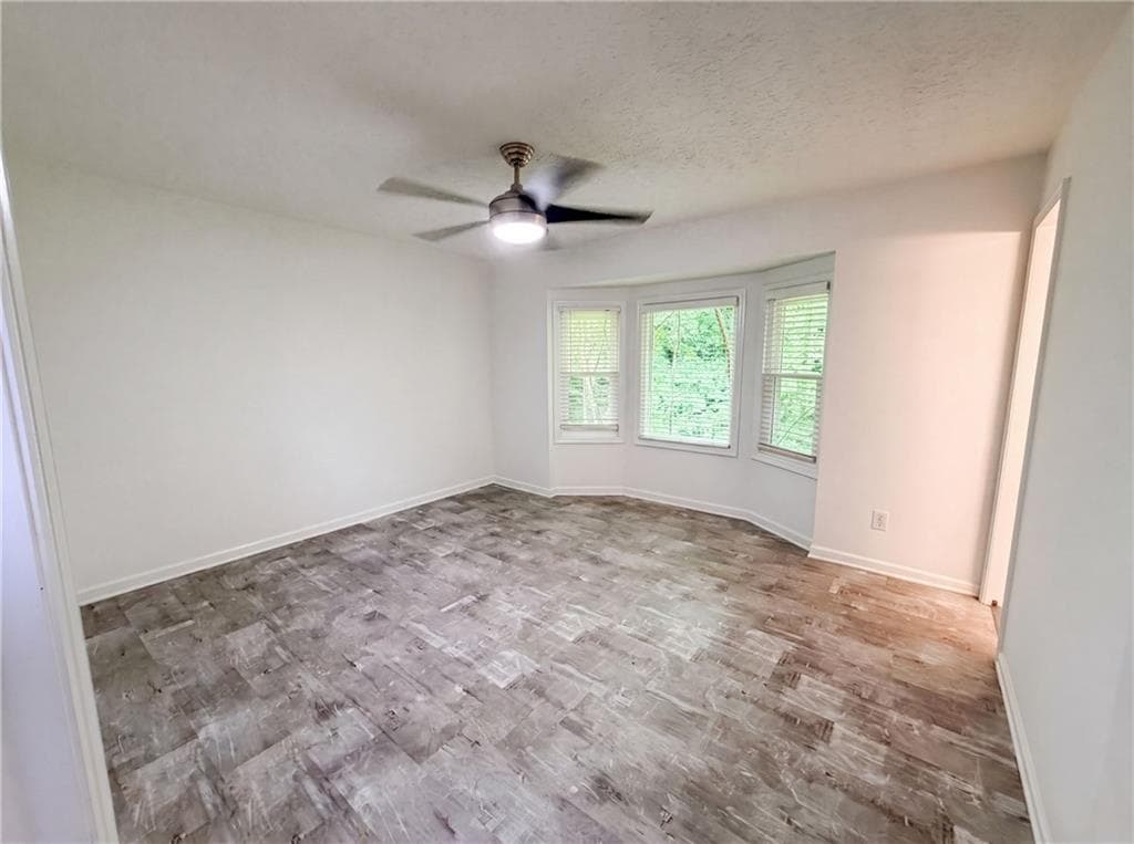 4 bedroom, 3 bathroom, 2,122 sq ft single family residence for sale at 4378 Shady Drive, Lilburn, GA 30047 — photo 4