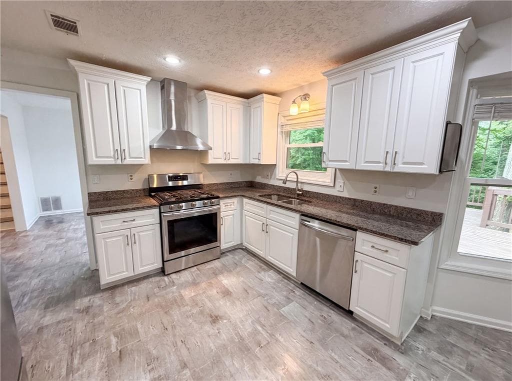 4 bedroom, 3 bathroom, 2,122 sq ft single family residence for sale at 4378 Shady Drive, Lilburn, GA 30047 — photo 6