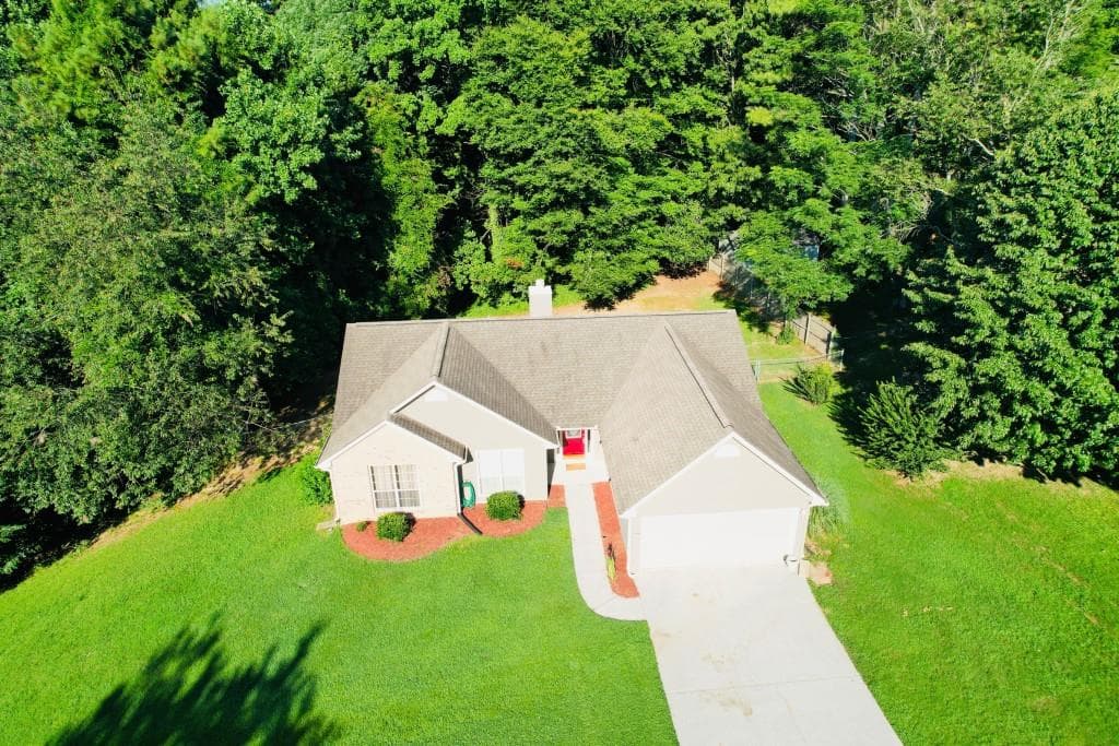 3 bedroom, 2 bathroom, 1,454 sq ft single family residence for sale at 1450 Millhaven Drive, Auburn, GA 30011 — photo 3