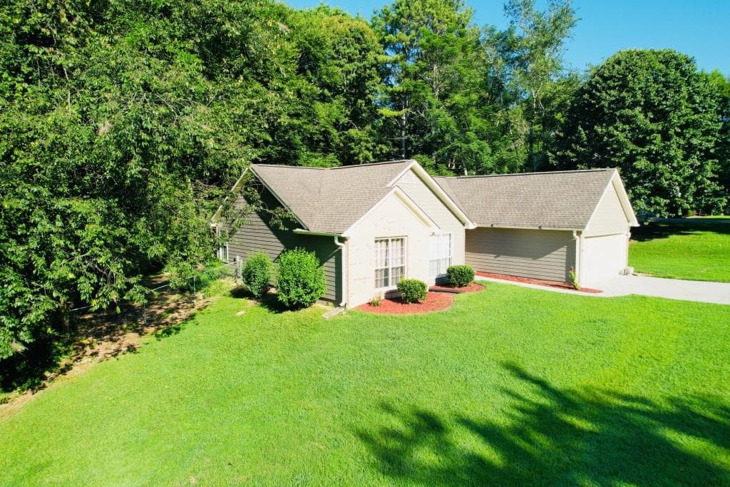 3 bedroom, 2 bathroom, 1,454 sq ft single family residence for sale at 1450 Millhaven Drive, Auburn, GA 30011 — photo 4
