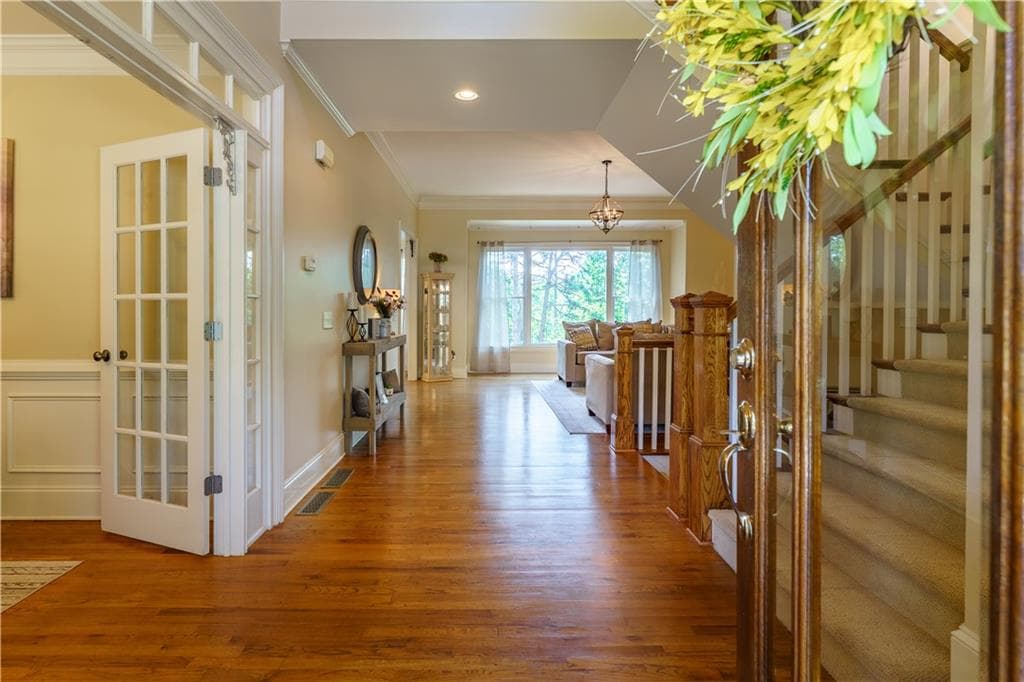 6 bedroom, 5 bathroom, 5,110 sq ft single family residence for sale at 6011 Lost Maple Lane, Sugar Hill, GA 30518 — photo 6