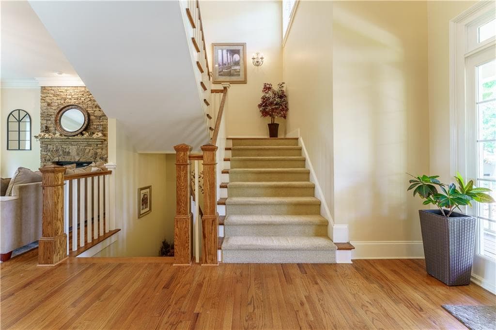 6 bedroom, 5 bathroom, 5,110 sq ft single family residence for sale at 6011 Lost Maple Lane, Sugar Hill, GA 30518 — photo 7