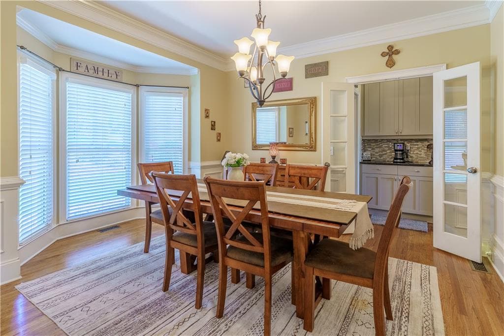 6 bedroom, 5 bathroom, 5,110 sq ft single family residence for sale at 6011 Lost Maple Lane, Sugar Hill, GA 30518 — photo 8
