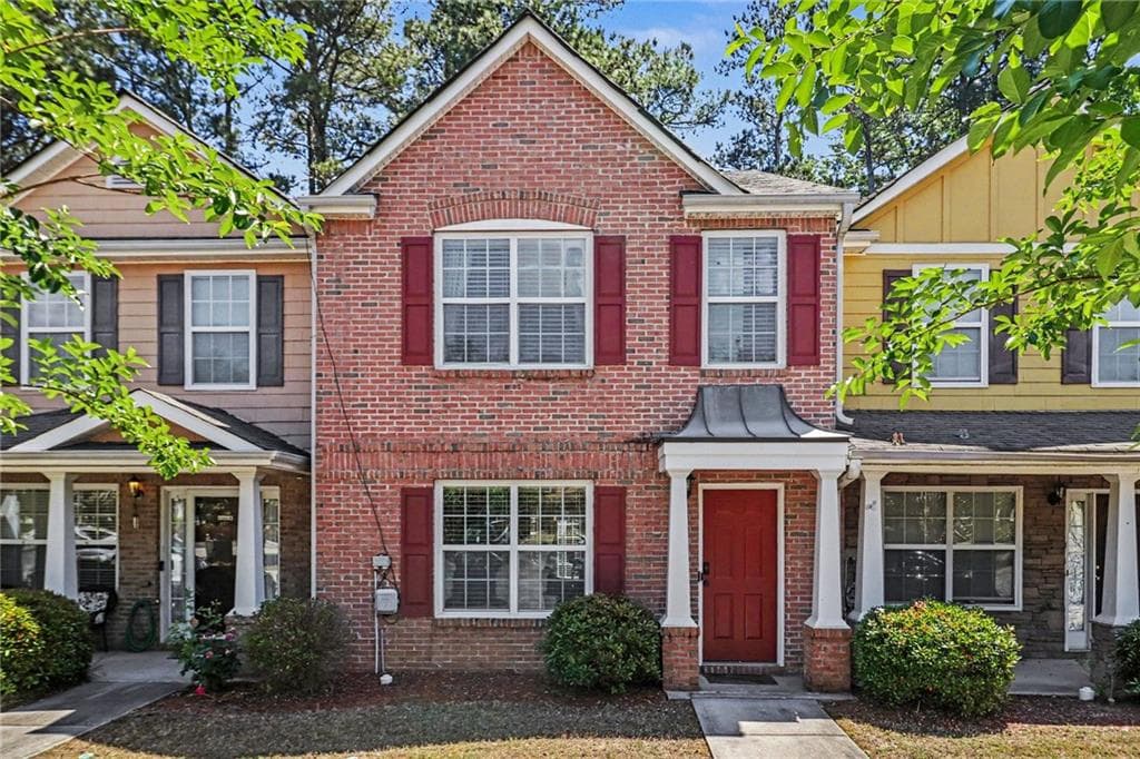 2 bedroom, 3 bathroom, 1,596 sq ft townhouse for sale at 7050 Galloway Point, Riverdale, GA 30296 — photo 1 of 23