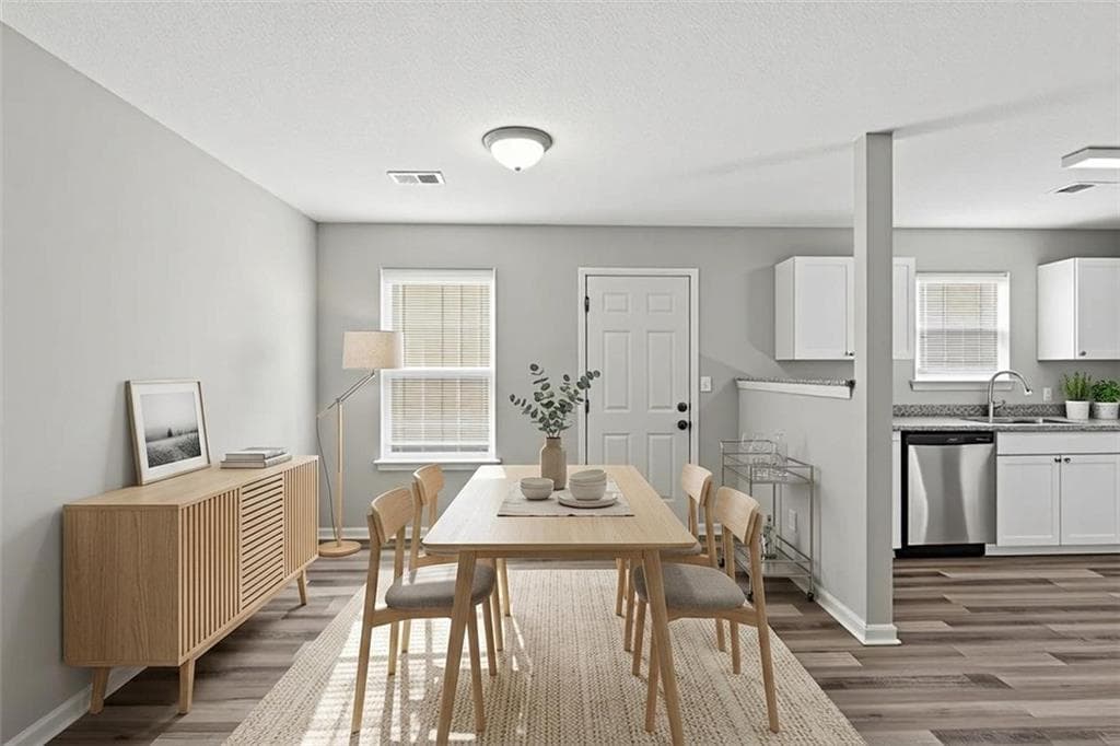 3 bedroom, 3 bathroom, 2,024 sq ft single family residence for sale at 1211 Brookstone Road, Atlanta, GA 30349 — photo 2