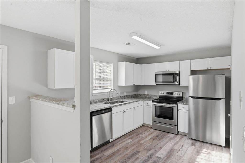 3 bedroom, 3 bathroom, 2,024 sq ft single family residence for sale at 1211 Brookstone Road, Atlanta, GA 30349 — photo 10