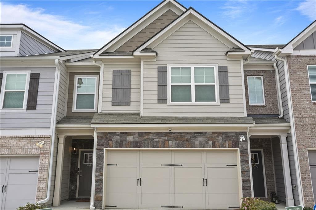 3 bedroom, 3 bathroom, 1,932 sq ft townhouse for rent at 7637 Avalon Boulevard, Fairburn, GA 30213 for $2,400 a month — photo 1 of 27